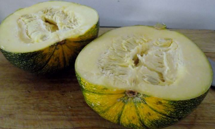 Raw pumpkin split in half.