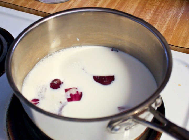 Onion steeping in milk for bechamel.