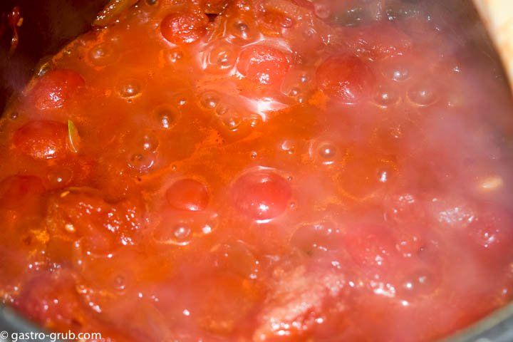 Cooking the tomatoes for the tomato puree.